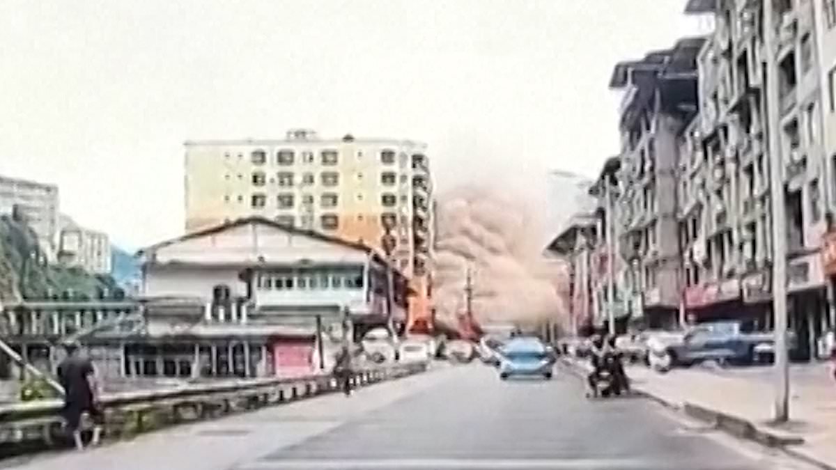 Moment terrifying landslide engulfs street in China and kills eight with 34 more missing as resuers race to reach survivors