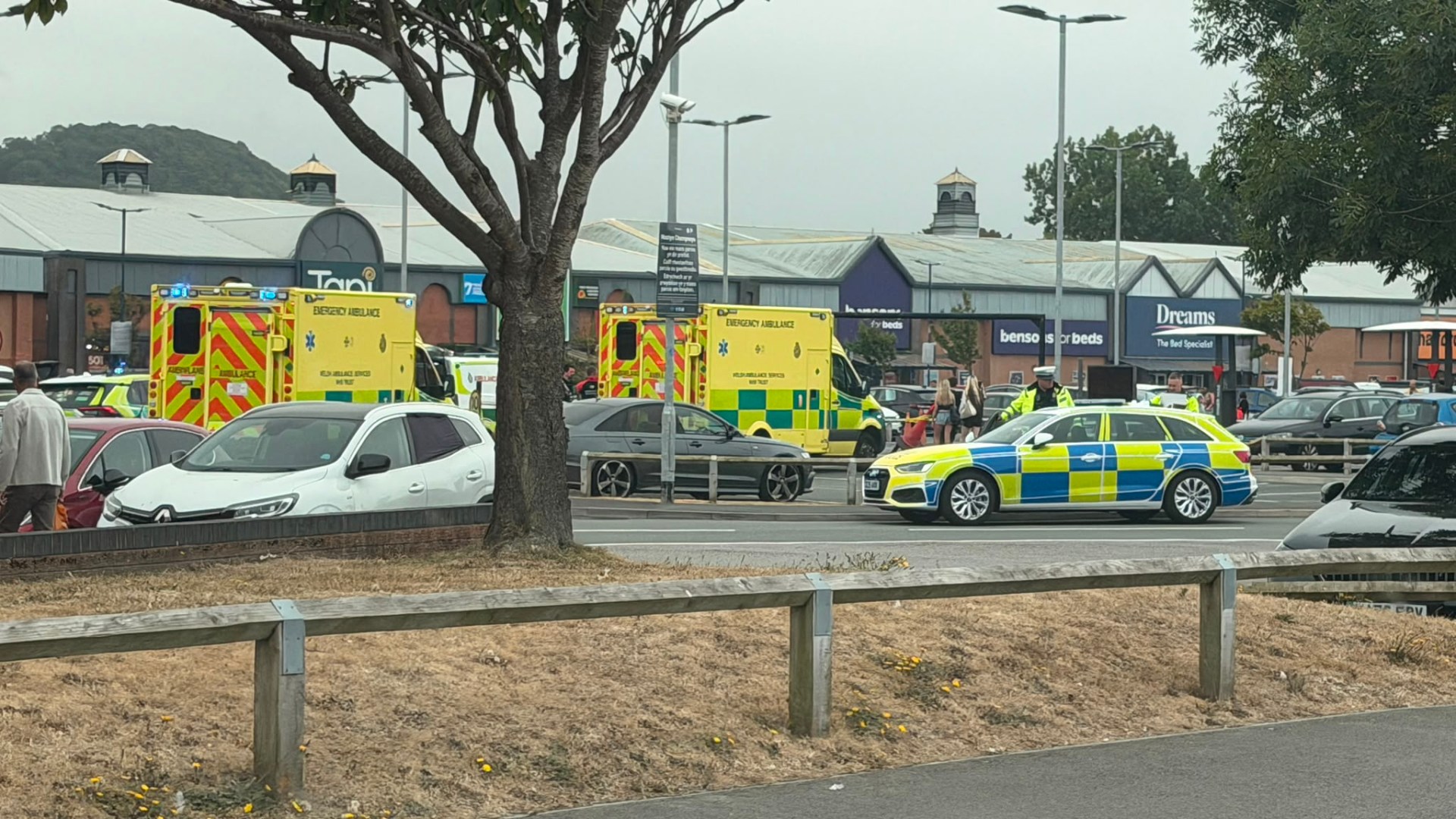 Four pedestrians & driver rushed to hospital after multi-car crash at shopping centre