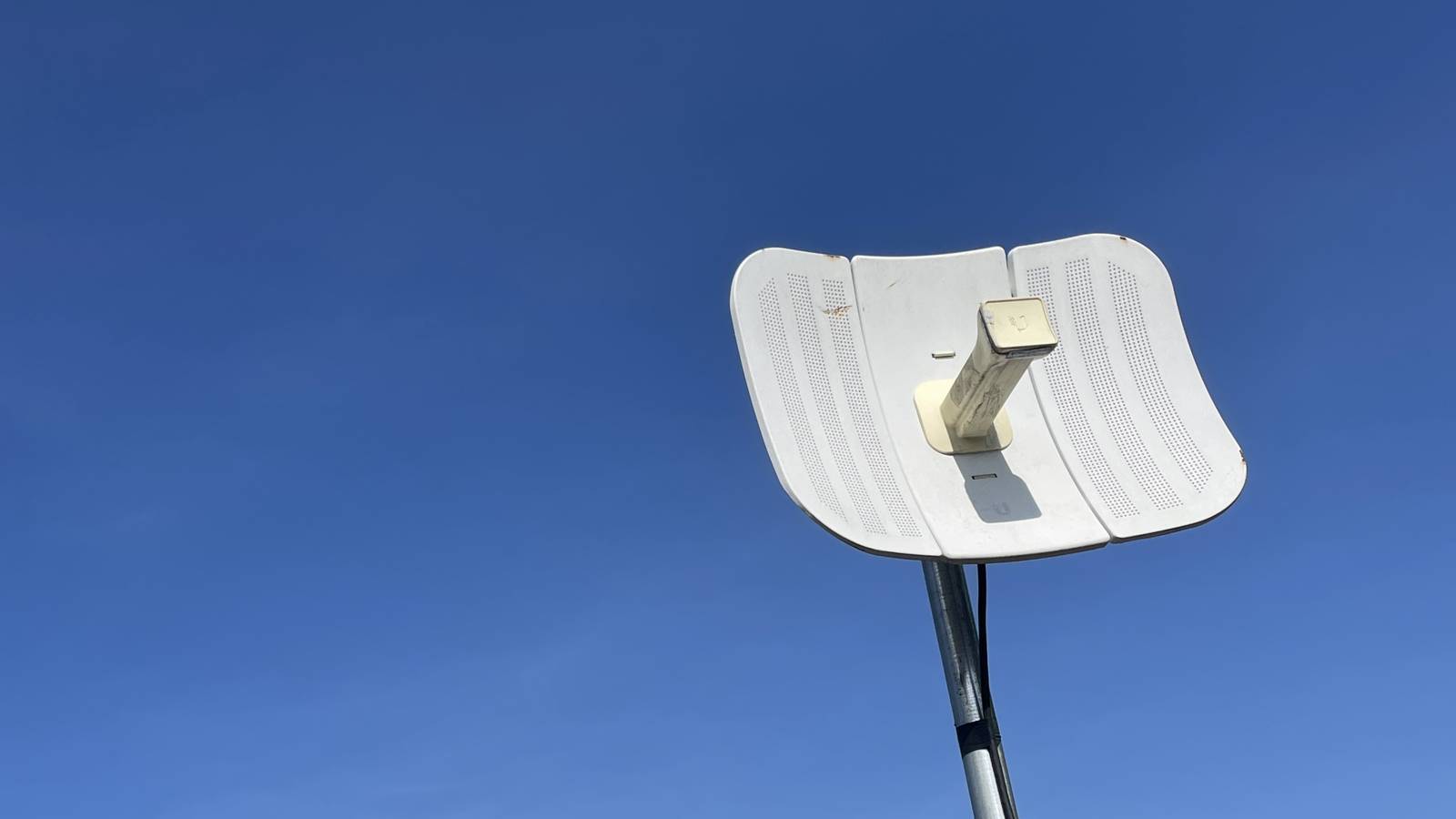 Your mesh wi-fi can't reach your backyard—here's what actually will