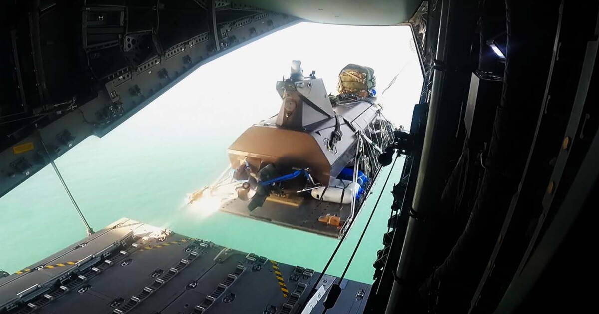 World-first airdrop of an autonomous drone boat into rough seas