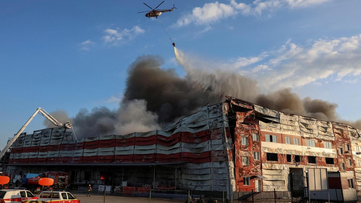 Russian missiles strike Kyiv killing one, wounding 13