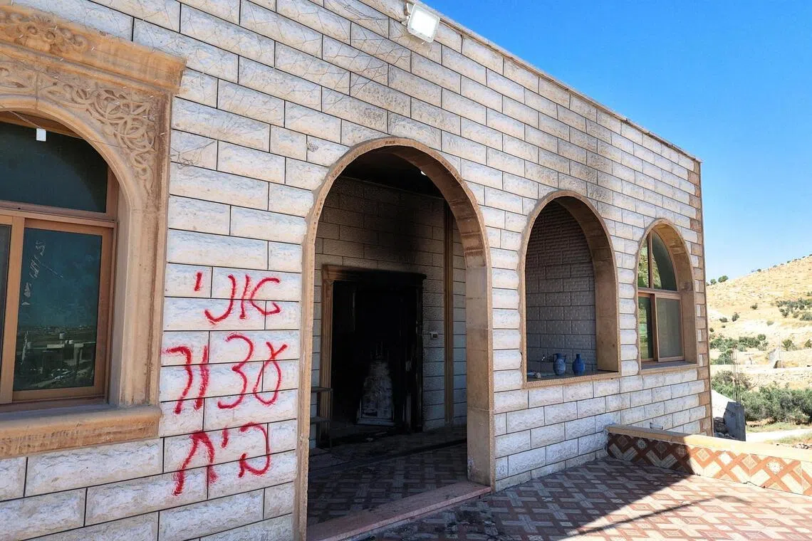Palestinians say Israeli settlers torch mosque, factory