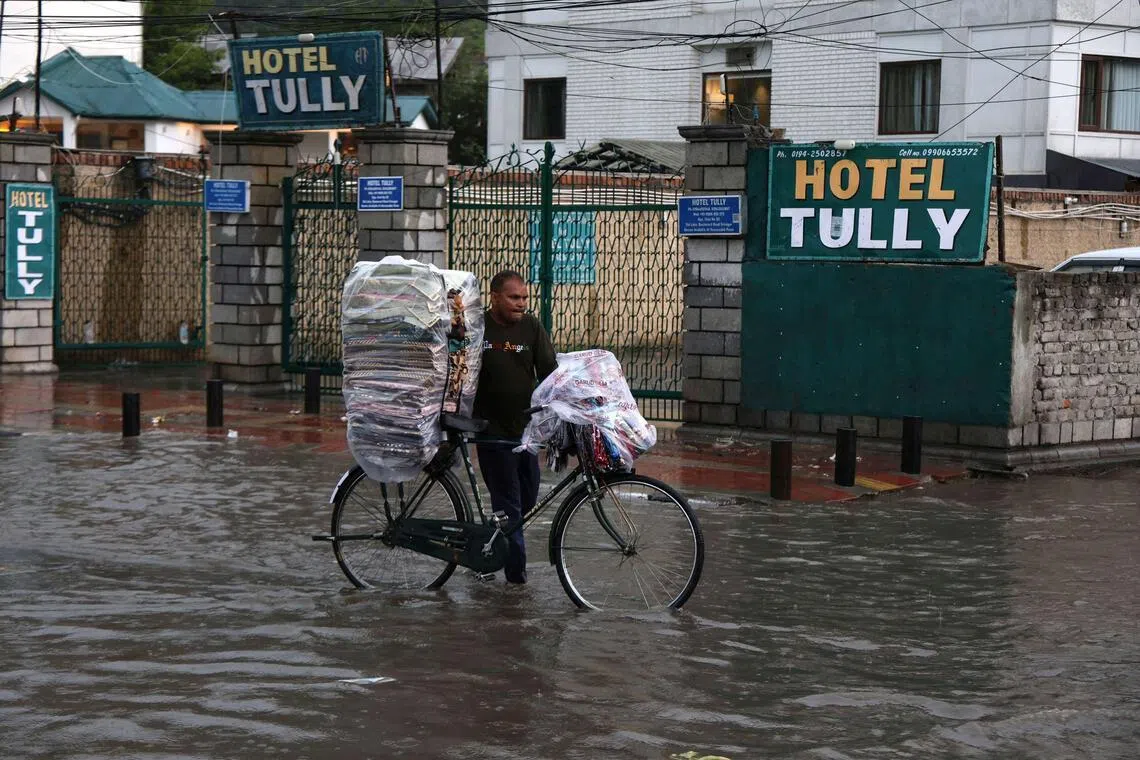 India floods and landslides kill at least 19